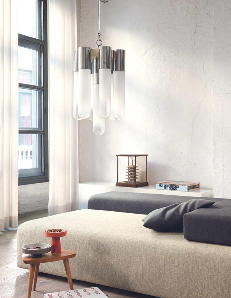 Airy white voile curtains in a chic living room. 