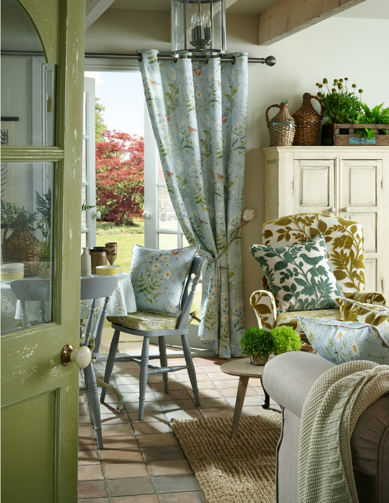 blue green curtains in a farmhouse inspired dining room. 