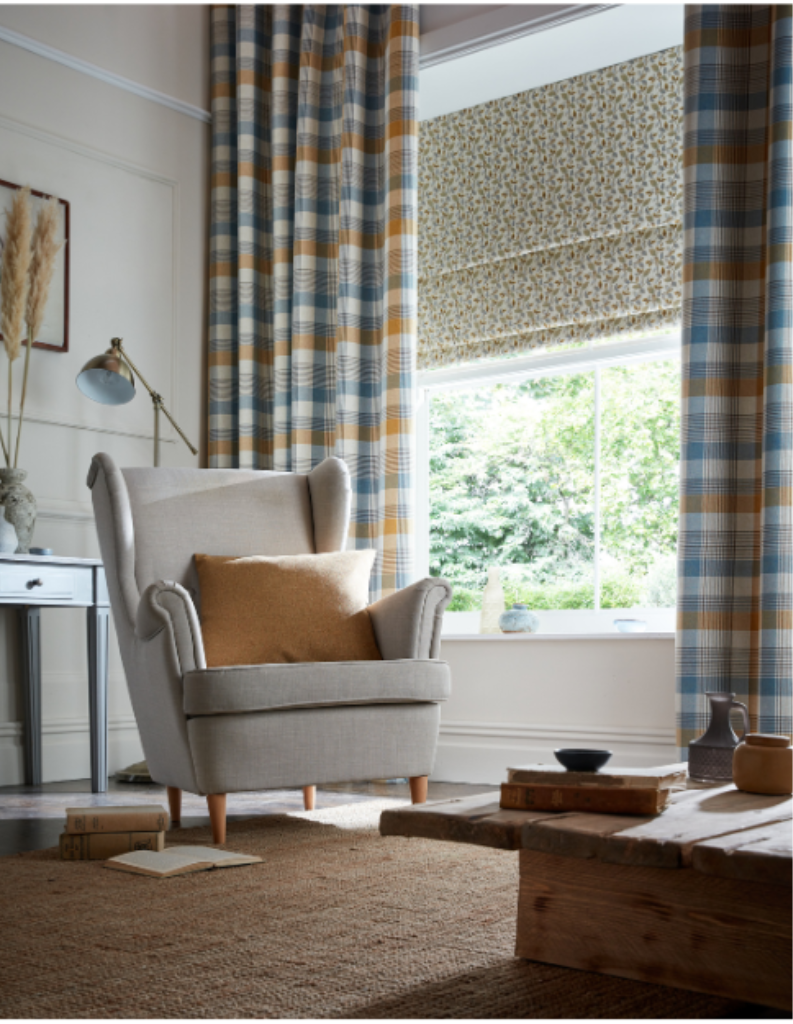 A country inspired sitting room with checked curtains and warm colours.