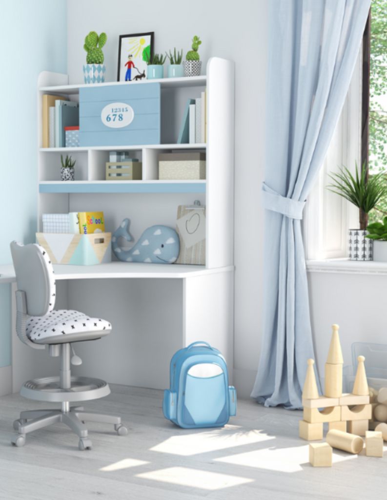 A beautiful child's bedroom featuring blue curtains and accessories.