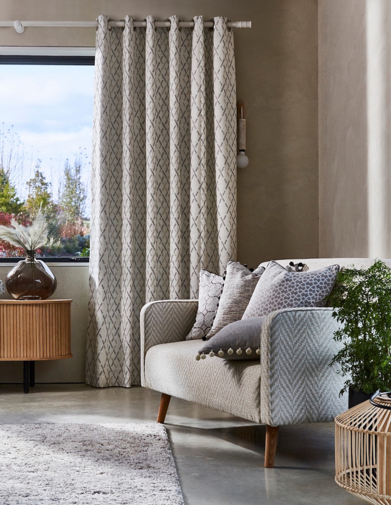 Soothing stone colours in a bright living room. 