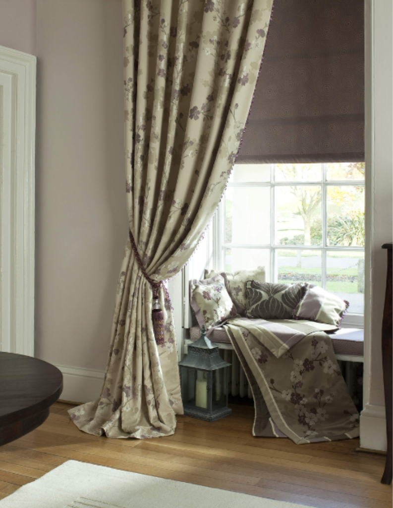 Curtains and Roman blind in a cosy living room